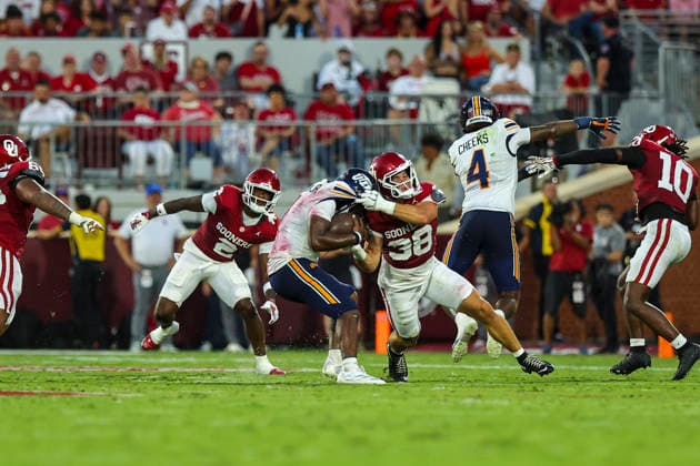 NORMAN, OK - SEPTEMBER 04: Oklahoma Sooner linebacker Owen Heinecke (38) tackles UTEP Miner quarterback EJ Colson Jr. (1) during the college football game between the Oklahoma Sooners and the UTEP Miners on September 04, 2026 at Gaylord Family Oklahoma Memorial Stadium in Norman, OK. (Photo by Chad Hamilton Icon Sportswire) COLLEGE FOOTBALL: SEP 04 UTEP at Oklahoma EDITORIAL USE ONLY Icon260903082