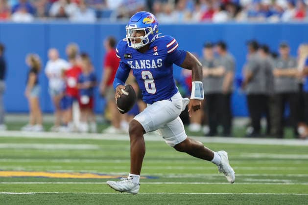 LAWRENCE, KS - SEPTEMBER 04: Isaiah Marshall 8 of the Kansas Jayhawks runs with the ball in the first quarter of a college football game between the Long Island Sharks and Kansas Jayhawks on Sep 4, 2026 at David Booth Memorial Stadium in Lawrence, KS. (Photo by Scott Winters Icon Sportswire) COLLEGE FOOTBALL: SEP 04 LIU at Kansas EDITORIAL USE ONLY Icon2609040273