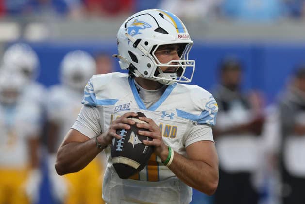 LAWRENCE, KS - SEPTEMBER 04: Luca Stanzani 11 of the Long Island University Sharks looks to pass in the first quarter of a college football game between the Long Island Sharks and Kansas Jayhawks on Sep 4, 2026 at David Booth Memorial Stadium in Lawrence, KS. (Photo by Scott Winters Icon Sportswire) COLLEGE FOOTBALL: SEP 04 LIU at Kansas EDITORIAL USE ONLY Icon2609040310
