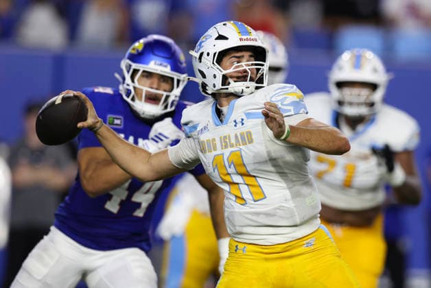 LAWRENCE, KS - SEPTEMBER 04: Luca Stanzani 11 of the Long Island University Sharks throws a pass under pressure from David Santiago 44 of the Kansas Jayhawks in the second quarter of a college football game between the Long Island Sharks and Kansas Jayhawks on Sep 4, 2026 at David Booth Memorial Stadium in Lawrence, KS. (Photo by Scott Winters Icon Sportswire) COLLEGE FOOTBALL: SEP 04 LIU at Kansas EDITORIAL USE ONLY Icon2609040461