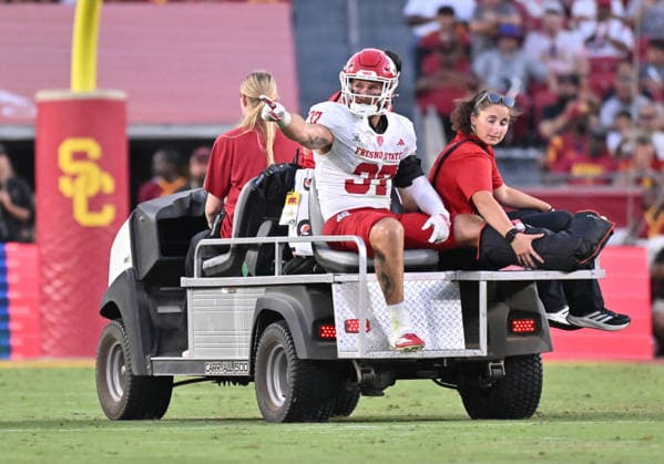 LOS ANGELES, CA - SEPTEMBER 04: Fresno State Bulldogs defensive back Ryan Wilson (37) taken off the field after a leg injury during the game between the USC Trojans and the Fresno State Bulldogs on September 04, 2026 at Los Angeles Memorial Coliseum in Los Angeles. (Photo by David Dennis Icon Sportswire) COLLEGE FOOTBALL: SEP 04 Fresno State at USC EDITORIAL USE ONLY Icon26090413