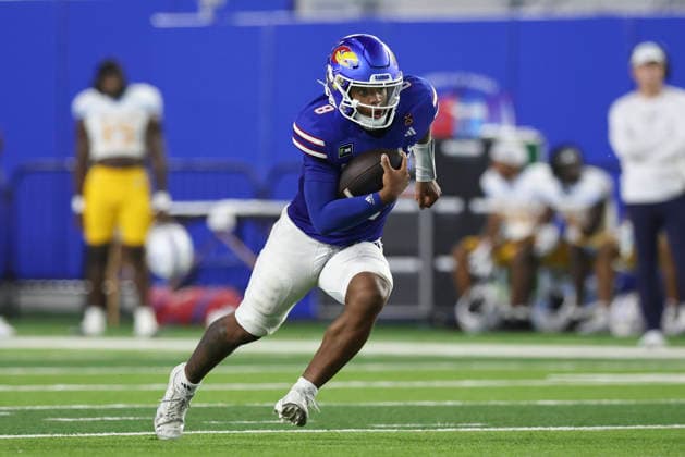 LAWRENCE, KS - SEPTEMBER 04: Isaiah Marshall 8 of the Kansas Jayhawks runs with the ball in the third quarter of a college football game between the Long Island Sharks and Kansas Jayhawks on Sep 4, 2026 at David Booth Memorial Stadium in Lawrence, KS. (Photo by Scott Winters Icon Sportswire) COLLEGE FOOTBALL: SEP 04 LIU at Kansas EDITORIAL USE ONLY Icon2609040512