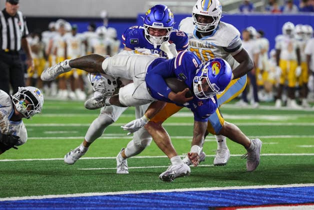 LAWRENCE, KS - SEPTEMBER 04: Isaiah Marshall 8 of the Kansas Jayhawks dives into the end zone for a touchdown in the third quarter of a college football game between the Long Island Sharks and Kansas Jayhawks on Sep 4, 2026 at David Booth Memorial Stadium in Lawrence, KS. The play was nullified due to a holding penalty. (Photo by Scott Winters Icon Sportswire) COLLEGE FOOTBALL: SEP 04 LIU at Kansas EDITORIAL USE ONLY Icon2609040604