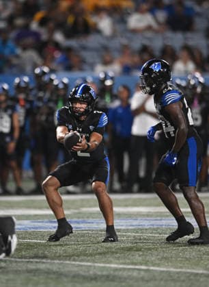 ATLANTA, GA - September 04: Georgia State Panthers QB Ayden Pereira hands off to Qwantavius Wiggins (right) during game between the North Carolina A&T Aggies and the Georgia State Panthers on September 4, 2026 at Center Parc Credit Union Stadium in Atlanta, GA. (Photo by John Rivera Icon Sportswire) COLLEGE FOOTBALL: SEP 04 NC A&T at Georgia State EDITORIAL USE ONLY Icon426260904016