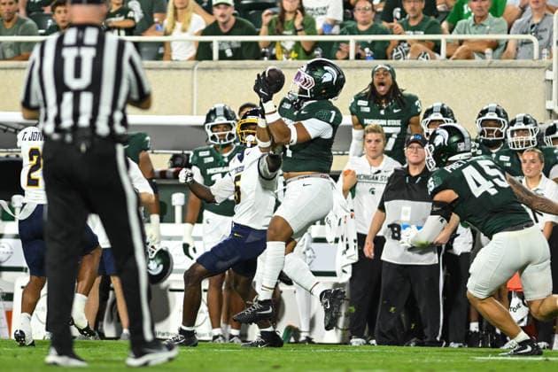 EAST LANSING, MI - SEPTEMBER 04: Michigan State Spartans edge Kenny Soares Jr. (1) corrals a first half interception during a college football game between the Michigan State Spartans and Toledo Rockets on September 4, 2026 at Spartan Stadium in East Lansing, MI. (Photo by Adam Ruff Icon Sportswire) COLLEGE FOOTBALL: SEP 04 Toledo at Michigan State EDITORIAL USE ONLY Icon260908011