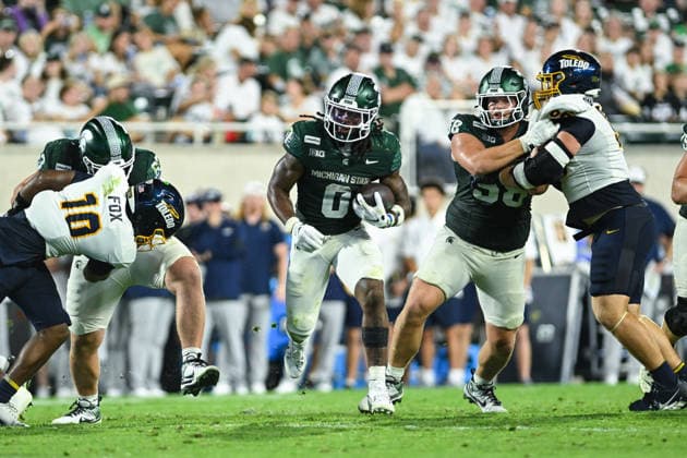 EAST LANSING, MI - SEPTEMBER 04: Michigan State Spartans running back Cam Edwards (0) finds a running lane during a college football game between the Michigan State Spartans and Toledo Rockets on September 4, 2026 at Spartan Stadium in East Lansing, MI. (Photo by Adam Ruff Icon Sportswire) COLLEGE FOOTBALL: SEP 04 Toledo at Michigan State EDITORIAL USE ONLY Icon260908019
