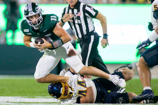 September 5, 2026, East Lansing, Michigan, U.S: Michigan State quarterback ALESSIO MILIVOJEVIC (11) carries the ball during Michigan State s 30-20 win over Toledo at Spartan Stadium. NCAA, College League, USA Football 2026: Michigan State 30:20 Toledo  - ZUMAm242 20260905_aap_m242_005 Copyright: xScottxMapesx