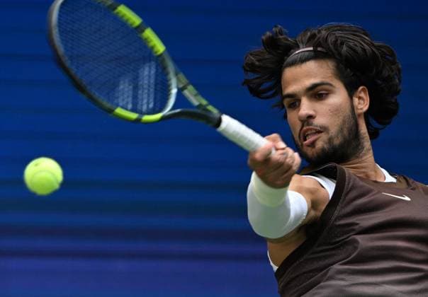 (260905) -- NEW YORK, Sept. 5, 2026 -- Carlos Alcaraz of Spain returns the ball during the men s singles third round match against Wu Yibing of China at the 2026 US Open tennis championships in New York, the United States, Sept. 4, 2026. ) (SP)U.S.-NEW YORK-TENNIS-US OPEN-MEN S SINGLES LixRui 