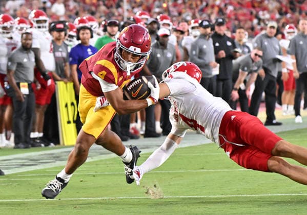 LOS ANGELES, CA - SEPTEMBER 04: Southern California Trojans wide receiver Trent Mosley (4) carries the ball during the game between the USC Trojans and the Fresno State Bulldogs on September 04, 2026 at Los Angeles Memorial Coliseum in Los Angeles. (Photo by David Dennis Icon Sportswire) COLLEGE FOOTBALL: SEP 04 Fresno State at USC EDITORIAL USE ONLY Icon26090424