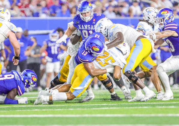 NCAA, College League, USA Football 2026: LIU Vs Kansas SEP 04 Sep 4, 2026: Kansas Jayhawks linebacker Quincy Davis (13) tackles Long Island Sharks running back Nasir Hennigan (25) in Lawrence, KS, USA; at Memorial Stadium. Mandatory Credit: Roman Puno-Cal Media (Credit Image: Â Roman Puno Cal Sport Media) Lawrence Ks USA EDITORIAL USE ONLY Copyright: xx ZUMA-20260904_zma_c04_055.jpg RomanxPunox csmphotothree517070