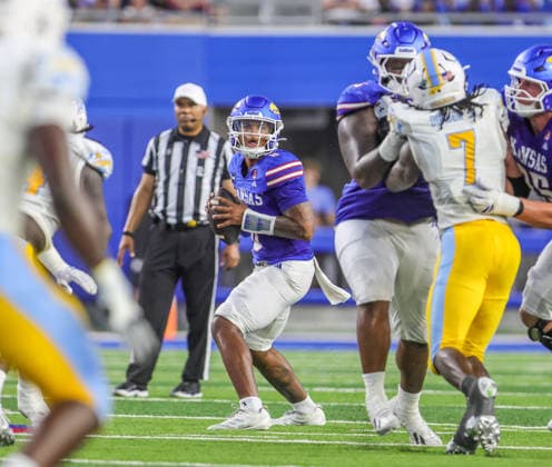 NCAA, College League, USA Football 2026: LIU Vs Kansas SEP 04 Sep 4, 2026: Kansas Jayhawks quarterback Isaiah Marshall (8) surveys the field prior to throwing the ball against Long Island Sharks in Lawrence, KS, USA; at Memorial Stadium. Mandatory Credit: Roman Puno-Cal Media (Credit Image: Â Roman Puno Cal Sport Media) Lawrence Ks USA EDITORIAL USE ONLY Copyright: xx ZUMA-20260904_zma_c04_054.jpg RomanxPunox csmphotothree517071