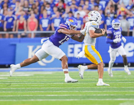 NCAA, College League, USA Football 2026: LIU Vs Kansas SEP 04 Sep 4, 2026: Kansas Jayhawks linebacker Quincy Davis (13) pushes Long Island Sharks quarterback Luca Stanzani (11) out of bounds in Lawrence, KS, USA; at Memorial Stadium. Mandatory Credit: Roman Puno-Cal Media (Credit Image: Â Roman Puno Cal Sport Media) Lawrence Ks USA EDITORIAL USE ONLY Copyright: xx ZUMA-20260904_zma_c04_049.jpg RomanxPunox csmphotothree517076