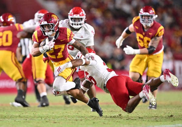 LOS ANGELES, CA - SEPTEMBER 04: Southern California Trojans running back Riley Wormley (27) carries the balll for a gain of yards during the game between the USC Trojans and the Fresno State Bulldogs on September 04, 2026 at Los Angeles Memorial Coliseum in Los Angeles. (Photo by David Dennis Icon Sportswire) COLLEGE FOOTBALL: SEP 04 Fresno State at USC EDITORIAL USE ONLY Icon26090435