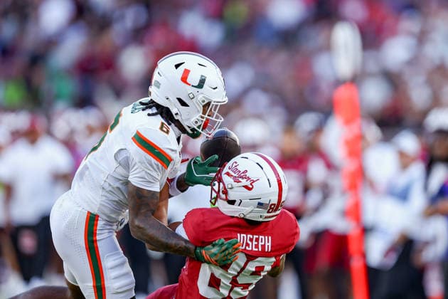PALO ALTO, CA - SEPTEMBER 04: Miami Hurricanes defensive back Xavier Lucas (6) breaks up a pass intended for Stanford Cardinal wide receiver Atticus Joseph (89) during a college football game between the Miami Hurricanes and Stanford Cardinal on September 4, 2026 at Stanford Stadium in Palo Alto, CA. (Photo by Trinity Machan Icon Sportswire) COLLEGE FOOTBALL: SEP 04 Miami at Stanford EDITORIAL USE ONLY Icon260904000163230