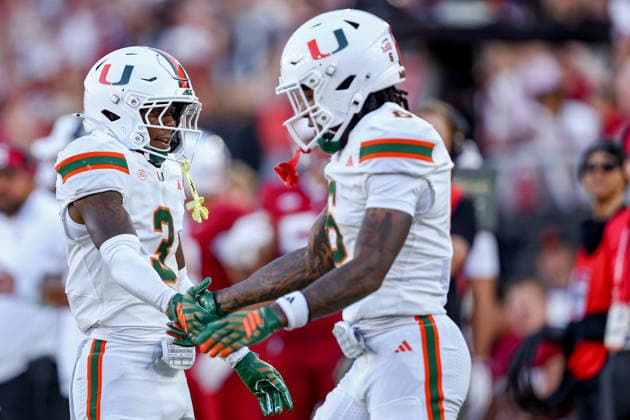 PALO ALTO, CA - SEPTEMBER 04: Miami Hurricanes defensive back Bryce Fitzgerald (3) celebrates with Miami Hurricanes running back Charmar Brown (6) after breaking up a pass during a college football game between the Miami Hurricanes and Stanford Cardinal on September 4, 2026 at Stanford Stadium in Palo Alto, CA. (Photo by Trinity Machan Icon Sportswire) COLLEGE FOOTBALL: SEP 04 Miami at Stanford EDITORIAL USE ONLY Icon260904000163231