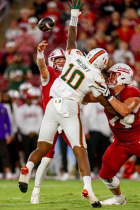 PALO ALTO, CA - SEPTEMBER 04: Stanford Cardinal quarterback Davis Warren (8) throws a pass blocked by Miami Hurricanes defensive lineman Damon Wilson II (10) during a college football game between the Miami Hurricanes and Stanford Cardinal on September 4, 2026 at Stanford Stadium in Palo Alto, CA. (Photo by Trinity Machan Icon Sportswire) COLLEGE FOOTBALL: SEP 04 Miami at Stanford EDITORIAL USE ONLY Icon260904000163243