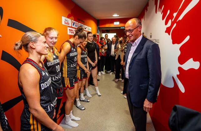 Basketball Berlin, September 4, 2026 FIBA Women’s Basketball World Cup Germany 2026 Preliminary Round Group Spain (ESP) Germany (GER) Federal Chancellor Friedrich Merz as a guest Visit by the German team after the game in front of the locker room Alexandra Wilke, Germany, No. 03 (left) Frida Bühner, Germany, No. 20, and others