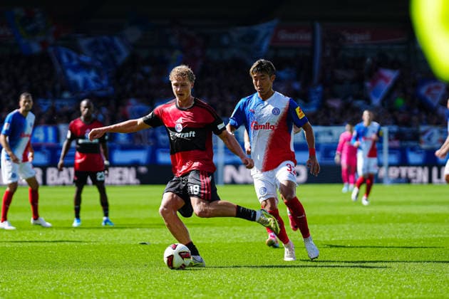 Piet Scobel (1. FC Nürnberg, 19), Hiroki Sekine (Holstein Kiel, 32) GER, Holstein Kiel vs. 1. FC Nürnberg, Fußball, 2. Bundesliga, Spieltag 04, Saison 2026 2027, 05.09.2026 DFL REGULATIONS PROHIBIT ANY USE OF PHOTOGRAPHS AS IMAGE SEQUENCES AND OR QUASI-VIDEO GER, Holstein Kiel vs. 1. FC Nürnberg, Fußball, 2. Bundesliga, Spieltag 04, Saison 2026 2027, 05.09.2026 Kiel *** Piet Scobel, 1 FC Nürnberg, 19; Hiroki Sekine, Holstein Kiel, 32 (GER); Holstein Kiel vs. 1 FC Nürnberg, Soccer, 2. Bundesliga, Matchday 04, 2026–2027 Season, September 5, 2026 DFL regulations prohibit any use of photographs as image sequences and or quasi-video, GER, Holstein Kiel vs. 1 FC Nuremberg, Soccer, 2. Bundesliga, Matchday 04, 2026–2027 Season, September 5, 2026, Kiel Copyright: xEibner-Pressefoto MarcelxvonxFehrnx EP_MFN