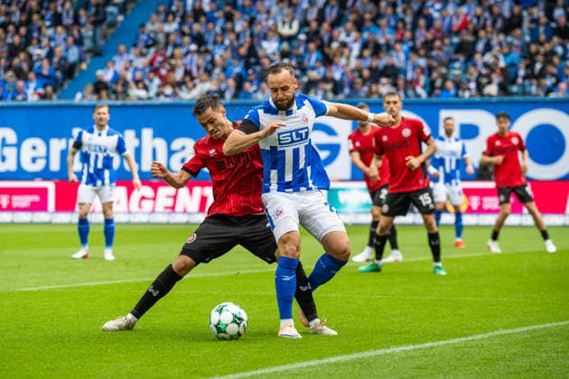 Rostock, Germany September 5, 2026 3rd League 2026–2027 Matchday 4: FC Hansa Rostock vs. SV Wehen Wiesbaden Pictured from left, in a tackle: Robin Kalem (SV Wehen Wiesbaden) and David Kopacz (Hansa Rostock). DFB and DFL regulations prohibit any use of photographs as image sequences and or quasi-video Copyright: xFotostandx xVoelkerx