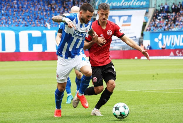 FC Hansa Rostock vs. Wehen Wiesbaden, Rostock, September 5, 2026, Soccer 3rd Division: FC Hansa Rostock vs. Wehen Wiesbaden, Leon Dajuku of FC Hansa Rostock vs. Robin Kalem of Wehen Wiesbaden, Rostock, Ostseestadion, Mecklenburg-Western Pomerania, Germany