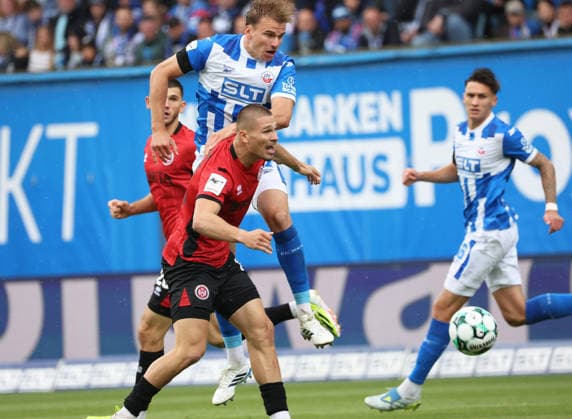 FC Hansa Rostock vs. Wehen Wiesbaden Rostock, September 5, 2026, Soccer 3rd Division FC Hansa Rostock vs. Wehen Wiesbaden Florian Carstens of FC Hansa Rostock (top) against Marcus Müller of Wehen Wiesbaden Rostock Ostseestadion, Mecklenburg-Western Pomerania, Germany