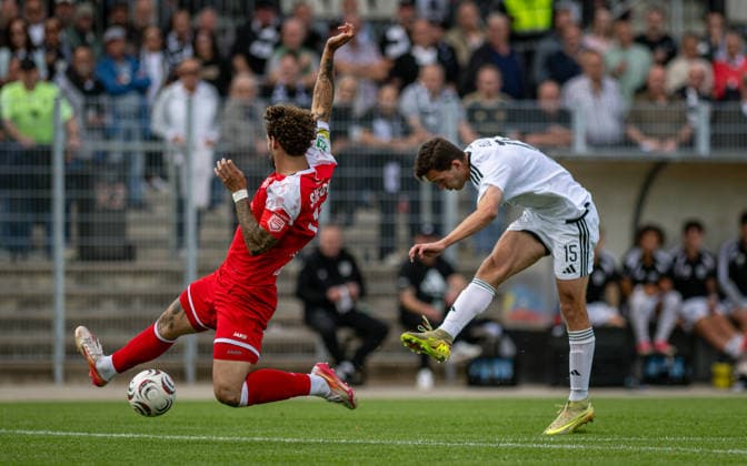 Soccer, 2026–2027 Season, Regionalliga West, September 5, 2026, Matchday 7, Men’s, 1 FC Bocholt (white) vs. Sportfreunde Siegen (red); from left: Jan Luca Rumpf (SF Siegen), Lennar Garlipp (1 FC Bocholt); Bocholt Stadion am Huenting, Germany 260905_fb_1fc-bocholt_sf-siegen_58420