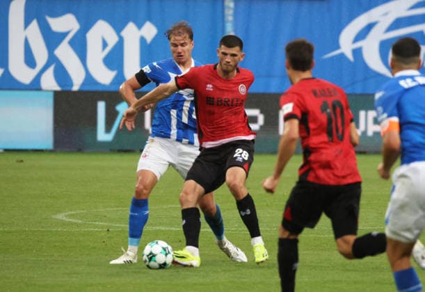 FC Hansa Rostock vs. Wehen Wiesbaden Rostock, September 5, 2026, Soccer 3rd Division FC Hansa Rostock vs. Wehen Wiesbaden Moritz Flotho (Wehen Wiesbaden) vs. Florian Carstens (FC Hansa Rostock) Rostock, Ostseestadion, Mecklenburg-Western Pomerania, Germany