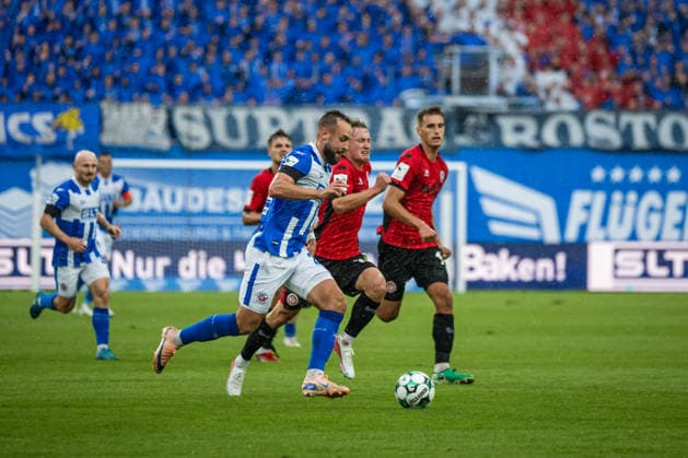 Rostock, Germany September 5, 2026 3rd League 2026–2027 Matchday 4 FC Hansa Rostock vs. SV Wehen Wiesbaden Pictured from left, in a tackle: David Kopacz (Hansa Rostock) and Fabian Greilinger (SV Wehen Wiesbaden). DFB and DFL regulations prohibit any use of photographs as image sequences and or quasi-video Copyright: xFotostandx xVoelkerx