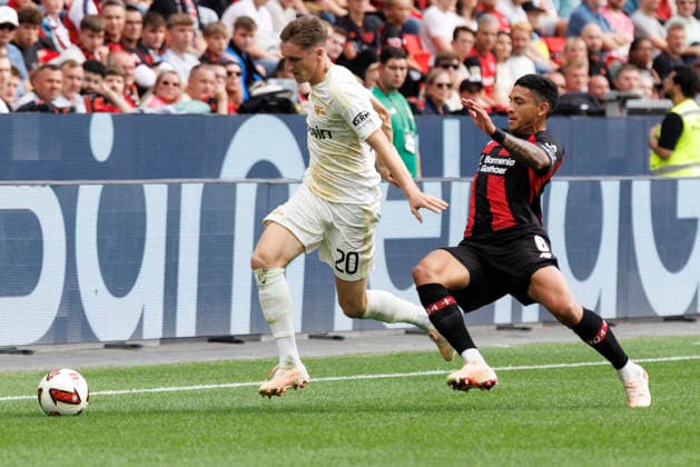 LEVERKUSEN, GERMANY - SEPTEMBER 5, 2026 : Michel Aebischer (1. FC Union Berlin, 20) and Equi Fernández (Bayer 04 Leverkusen, 6) tackling during the German Bundesliga match on gameday 2 between Bayer 04 Leverkusen vs. 1. FC Union Berlin at BayArena on September 5, 2026 in Leverkusen, Germany. DFL REGULATIONS PROHIBIT ANY USE OF PHOTOGRAPHS AS IMAGE SEQUENCES AND OR QUASI-VIDEO. Northrhine-Westphalia Germany Copyright: xAxelxKohringx