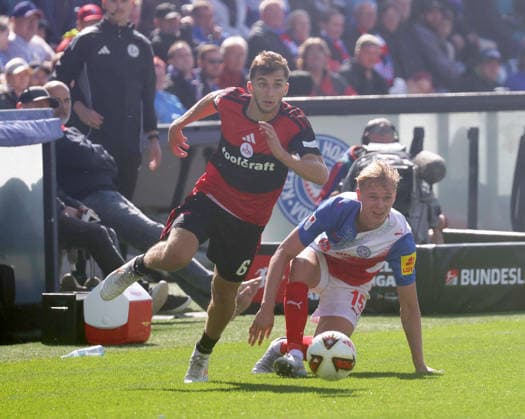 Adam Mrkhiev (1.FC Nuernberg), Kasper Davidsen (Holstein Kiel) Fussball, Herren, Saison 2026 2027, 2.BL, Holstein Stadion, Holstein Kiel gegen 1.FC Nuernberg, 2-2 DFL REGULATIONS PROHIBIT ANY USE OF PHOTOGRAPHS AS IMAGE SEQUENCES AND OR QUASI-VIDEO. *** Adam Mrkhiev, 1. FC Nuremberg; Kasper Davidsen, Holstein Kiel Soccer, Men s Division, 2026–2027 Season, 2. Bundesliga, Holstein Stadium, Holstein Kiel vs. 1. FC Nuremberg, 2–2. DFL regulations prohibit any use of photographs as image sequences and or quasi-video.
