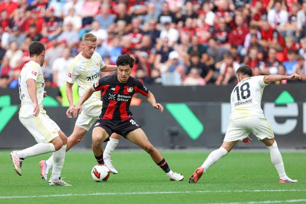Rani Khedira (1.FC Union Berlin), Ibrahim Maza (Bayer 04 Leverkusen) und Josip Juranovic (1.FC Union Berlin) im Zweikampf waehrend des Spiels der 1. Bundesliga zwischen Bayer 04 Leverkusen und 1. FC Union Berlin, BayArena am 05. September 2026 in Leverkusen, Deutschland. (Foto von Oliver Kaelke DeFodi Images) +++ Rani Khedira (1.FC Union Berlin), Ibrahim Maza (Bayer 04 Leverkusen) und Josip Juranovic (1.FC Union Berlin) battle for the ball during the Bundesliga match between Bayer 04 Leverkusen and 1. FC Union Berlin at BayArena on September 5, 2026 in Leverkusen, Germany. (Photo by Oliver Kaelke DeFodi Images) DFB DFL REGULATIONS PROHIBIT ANY USE OF PHOTOGRAPHS AS IMAGE SEQUENCES AND OR QUASI-VIDEO. (Photo by Oliver Kaelke DeFodi Images) - *** Rani Khedira of 1. FC Union Berlin, Ibrahim Maza of Bayer 04 Leverkusen, and Josip Juranovic of 1. FC Union Berlin in a tackle during the Bundesliga match between Bayer 04 Leverkusen and 1. FC Union Berlin, BayArena on September 5, 2026, in Leverkusen, Germany. Photo by Oliver Kaelke, DeFodi Images. Rani Khedira of 1. FC Union Berlin, Ibrahim Maza of Bayer 04 Leverkusen and Josip Juranovic of 1 FC Union Berlin battle for the ball during the Bundesliga match between Bayer 04 Leverkusen and 1 FC Union Berlin at BayArena on September 5, 2026 in Leverkusen, Germany. Photo by Oliver Kaelke, DeFodi Images. DFB and DFL regulations prohibit any use of photographs as image sequences and or quasi-video. Photo by Oliver Kaelke, DeFodi Images