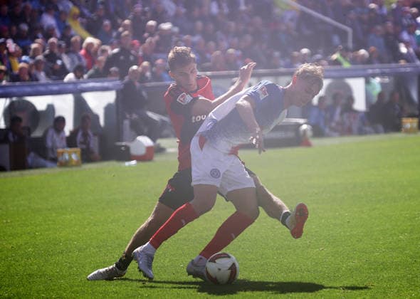 Adam Mrkhiev (1.FC Nuernberg), Kasper Davidsen (Holstein Kiel) Fussball, Herren, Saison 2026 2027, 2.BL, Holstein Stadion, Holstein Kiel gegen 1.FC Nuernberg, 2-2 DFL REGULATIONS PROHIBIT ANY USE OF PHOTOGRAPHS AS IMAGE SEQUENCES AND OR QUASI-VIDEO. *** Adam Mrkhiev, 1. FC Nuremberg; Kasper Davidsen, Holstein Kiel Soccer, Men s Division, 2026–2027 Season, 2. Bundesliga, Holstein Stadium, Holstein Kiel vs. 1. FC Nuremberg, 2–2. DFL regulations prohibit any use of photographs as image sequences and or quasi-video.