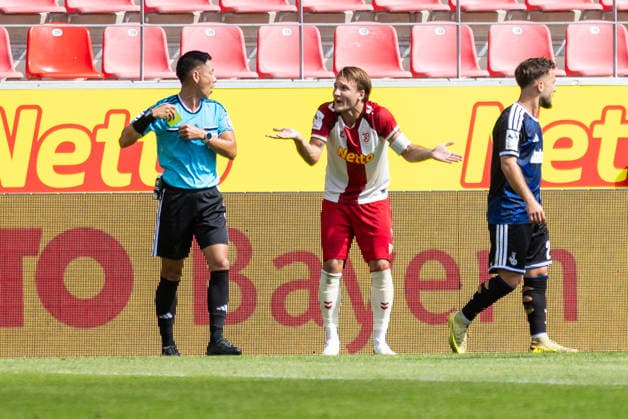 September 5, 2026, Soccer, GER, Season, 3rd Division, 2026–2027 Season, Matchday 4, SSV Jahn Regensburg vs. MSV Duisburg, Ryo Tanimoto (referee) and Felix Strauss (SSV Jahn Regensburg). DFL regulations prohibit any use of photographs as image sequences and or quasi-video.