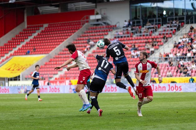 September 5, 2026, Soccer, GER, Season, 3rd Division, 2026–2027 Season, Matchday 4, SSV Jahn Regensburg vs. MSV Duisburg, Leo Mätzler (SSV Jahn Regensburg) vs. Max Besuschkow (Duisburg) and Tobias Fleckstein (Duisburg). DFL regulations prohibit any use of photographs as image sequences and or quasi-video.