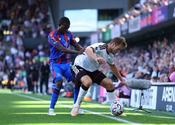 5th September 2026; Craven Cottage, Fulham, London, England; Premier League Football, Fulham versus Crystal Palace; Tyrick Mitchell of Crystal Palace challenges Joachim Andersen of Fulham JohnxPatrickxFletcher
