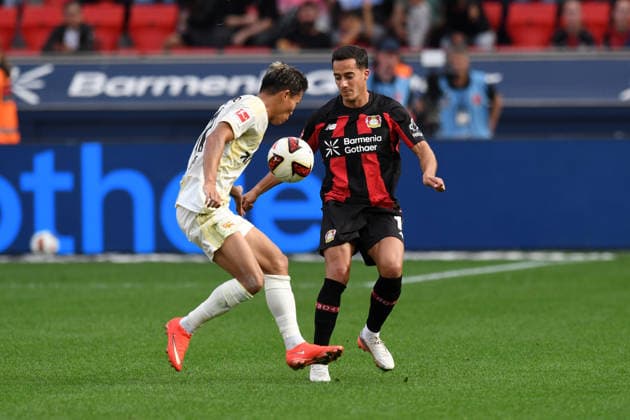 Lucas Vazquez ( Bayer 04 Leverkusen, 17 ) im Zweikampf mit Woo-Yeong Jeong ( 1 FC Union Berlin, 11 ). GER, Bayer 04 Leverkusen vs 1 FC Union Berlin, Fussball, Bundesliga, 2. Spieltag, Spielzeit 2026 2027, 05.09.2026 DFL REGULATIONS PROHIBIT ANY USE OF PHOTOGRAPHS AS IMAGE SEQUENCES AND OR QUASI-VIDEO GER, Bayer 04 Leverkusen vs 1 FC Union Berlin, Fussball, Bundesliga, 2. Spieltag, Spielzeit 2026 2027, 05.09.2026 Leverkusen *** Lucas Vázquez (Bayer 04 Leverkusen, 17) in a tackle with Woo Yeong Jeong (1. FC Union Berlin, 11, GER), Bayer 04 Leverkusen vs. 1. FC Union Berlin, Soccer, Bundesliga, Matchday 2, 2026–2027 season, September 5, 2026 DFL regulations prohibit any use of photographs as image sequences and or quasi-video GER, Bayer 04 Leverkusen vs. 1. FC Union Berlin, Soccer, Bundesliga, Matchday 2, 2026–2027 season, September 5, 2026, Leverkusen Copyright: xEibner-Pressefoto ThomasxThienelx EP_TTL