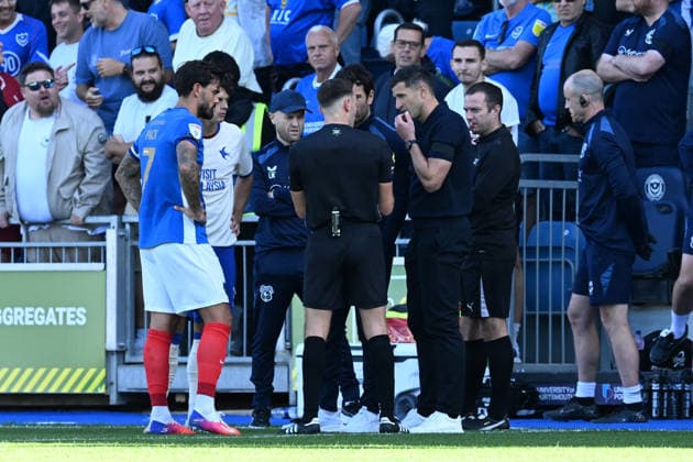 Portsmouth v Cardiff City, EFL Sky Bet Championship Referee Ben Speedie talks to Portsmouth manager John Mousinho and Cardiff City manager Brian Barry-Murphy fans have and altercation with Krystian Bielik (5) of Cardiff City during the EFL Sky Bet Championship match between Portsmouth and Cardiff City at Fratton Park, Portsmouth, UK on 5 September 2026. Portsmouth Fratton Park Hampshire UK Editorial use only DataCo restrictions apply See www.football-dataco.com , Copyright: xGrahamxHuntx PSI-24809-0101
