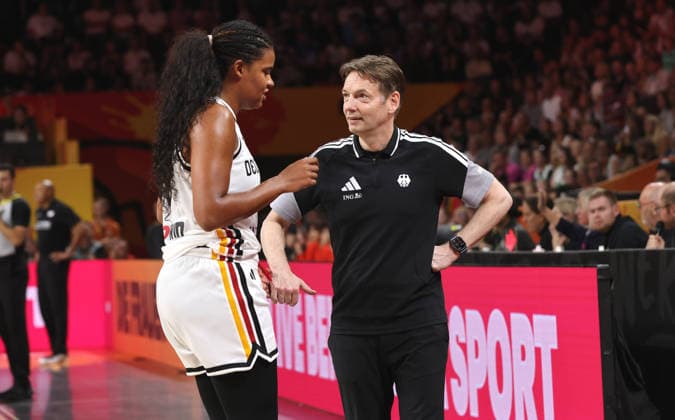 National Team Coach Olaf Lange talks with Nyara Sabally; Upper Body; Sports; Basketball; FIBA World Cup; World Championship; Women s World Cup; 2026-2027 Season; May 9, 2026; DBB; Germany (GER) vs. Japan (JPN)