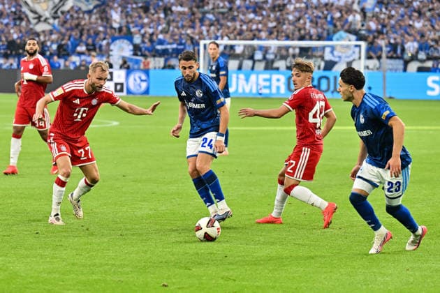 GELSENKIRCHEN, GERMANY; 05. SEPTEMBER: v. l. Konrad LAIMER (FC Bayern Munich 27), Adil AOUCHICHE (FC Schalke 24), Lennart KARL (FC Bayern Munich 42) and Soufiane EL-FAOUZI (FC Schalke 23) during the Bundesliga Match between FC Schalke 04 vs. FC Bayern Munich at Matchday 2 at Veltins Arena DFL REGULATIONS PROHIBIT ANY USE OF PHOTOGRAPHS AS IMAGE SEQUENCES AND OR QUASI-VIDEO Copyright: xBEAUTIFULxSPORTS Goldbergx