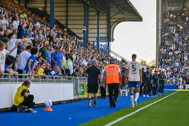 Football, Portsmouth FC v Cardiff City – Player gets into a tussle with a fan