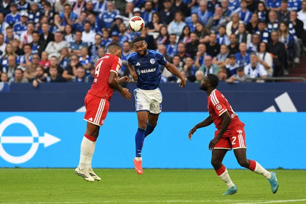 Jonathan Tah (FC Bayern Muenchen) und Moussa Sylla (FC Schalke 04) im Zweikampf waehrend des Spiels der 1. Bundesliga zwischen FC Schalke 04 und FC Bayern Muenchen, Veltins-Arena am 05. September 2026 in Gelsenkirchen, Deutschland. (Foto von Ralf Treese DeFodi Images) +++ Jonathan Tah (FC Bayern Muenchen) und Moussa Sylla (FC Schalke 04) battle for the ball during the Bundesliga match between FC Schalke 04 and FC Bayern Muenchen at Veltins-Arena on September 5, 2026 in Gelsenkirchen, Germany. (Photo by Ralf Treese DeFodi Images) DFB DFL REGULATIONS PROHIBIT ANY USE OF PHOTOGRAPHS AS IMAGE SEQUENCES AND OR QUASI-VIDEO. (Photo by Ralf Treese DeFodi Images) - *** Jonathan Tah of FC Bayern Munich and Moussa Sylla of FC Schalke 04 battle for the ball during the Bundesliga match between FC Schalke 04 and FC Bayern Munich at Veltins Arena on September 5, 2026, in Gelsenkirchen, Germany. Photo by Ralf Treese, DeFodi Images. Jonathan Tah of FC Bayern Munich and Moussa Sylla of FC Schalke 04 battle for the ball during the Bundesliga match between FC Schalke 04 and FC Bayern Munich at Veltins Arena on September 5, 2026 in Gelsenkirchen, Germany. Photo by Ralf Treese, DeFodi Images. DFB and DFL regulations prohibit any use of photographs as image sequences and or quasi-video. Photo by Ralf Treese, DeFodi Images.