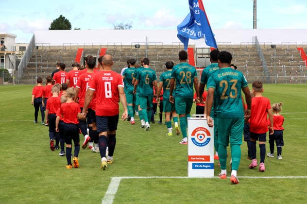 Soccer, Men s, Bavarian Regional League, 2026–2027 Season, SpVgg Unterhaching vs. FC Augsburg II, Amateur Teams; Both teams warming up, taking the field