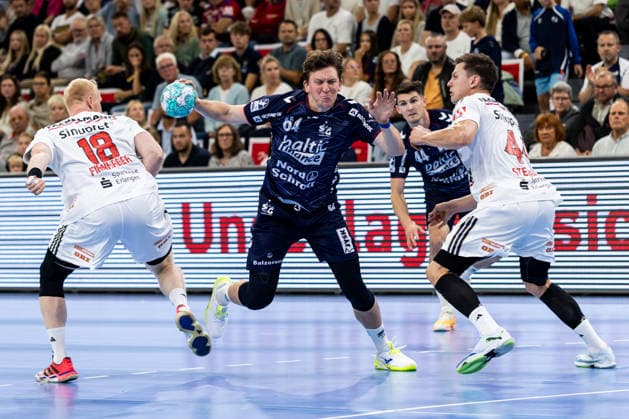 Opel HBL SG Flensburg Handewitt vs. HC Erlangen, September 5, 2026: Lasse Kjaer Moller (No. 64), SG Flensburg Handewitt, against Sebastian Firnhaber (No. 18), HC Erlangen, and Christoph Steinert (No. 44), HC Erlangen Opel HBL SG Flensburg Handewitt vs. HC Erlangen, GGW Arena on September 5, 2026 Copyright: xBEAUTIFULxSPORTS MarioxM.xKobergx