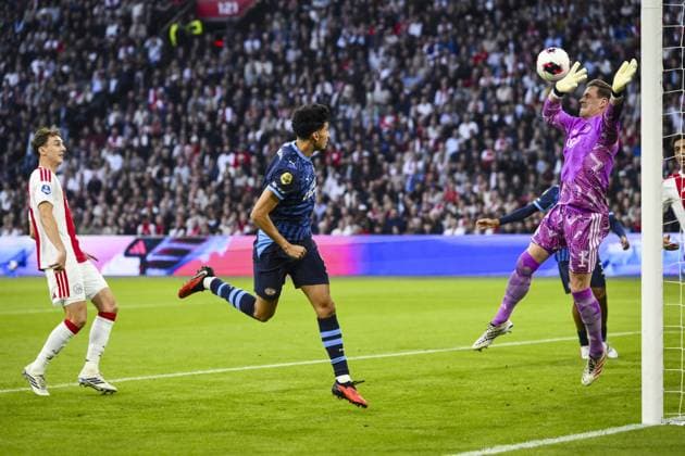 AMSTERDAM - (lr) Youri Baas of Ajax, Ricardo Pepi of PSV Eindhoven scores the 0-1 against Ajax goalkeeper Marc ter Stegen during the Dutch Eredivisie match between AFC Ajax and PSV Eindhoven at the Johan Cruijff ArenA on September 5, 2026 in Amsterdam, the Netherlands. OLAF KRAAK ANP Eredivisie 2026 27 xVIxANPxSportx xxANPxIVx 567271182 originalFilename: 567271182.jpg