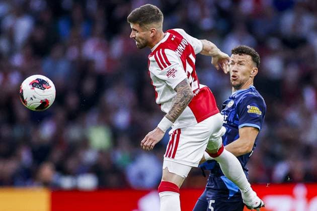 AMSTERDAM , 05-09-2026, JohanCruijff ArenA , season 2026 2027 , Dutch Eredivisie Football Match between Ajax and PSV. Picture shows Ajax player Caio Henrique and PSV Player Ivan Perisic Ajax - PSV  x206514711x Copyright: