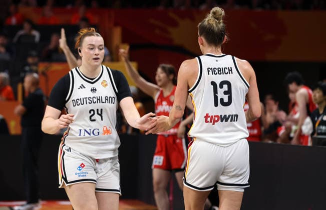 Lina Sontag high-fives Leonie Fiebich; Upper Body Workout; Basketball; FIBA World Cup; Women s World Championship; 2026-2027 Season; May 9, 2026; DBB; Germany (GER) vs. Japan (JPN)