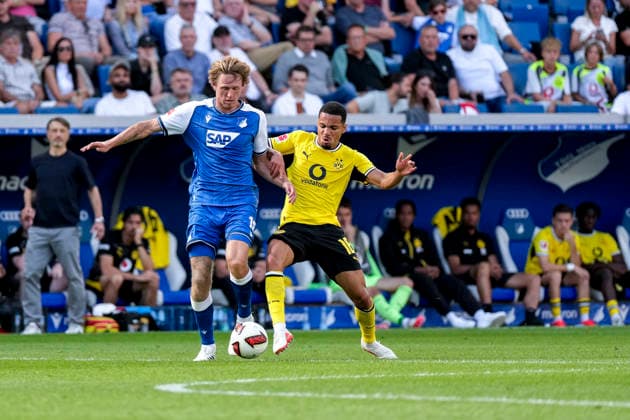 v.li.: Wouter Burger (Hoffenheim, 18), Ethan Chidiebere Nwaneri (BVB, 18), Zweikampf, Spielszene, Duell, duel, tackle, tackling, Dynamik, Action, Aktion, 05.09.2026, Sinsheim (Deutschland), Fussball, Bundesliga, TSG 1899 Hoffenheim - Borussia Dortmund, DFB DFL REGULATIONS PROHIBIT ANY USE OF PHOTOGRAPHS AS IMAGE SEQUENCES AND OR QUASI-VIDEO. *** v li Wouter Burger Hoffenheim, 18, Ethan Chidiebere Nwaneri BVB, 18, tackle, game scene, duel, tackle, tackling, dynamics, action, 05 09 2026, Sinsheim, Germany, soccer, Bundesliga, TSG 1899 Hoffenheim, Borussia Dortmund, DFB and DFL regulations prohibit any use of photographs as image sequences and or quasi-video xozx