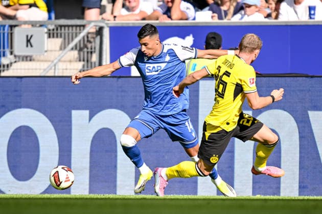 Adam Daghim (TSG 1899 Hoffenheim) und Julian Ryerson (Borussia Dortmund) im Zweikampf waehrend des spiels der 1. Bundesliga zwischen TSG Hoffenheim und Borussia Dortmund, SNP Arena am 05. September 2026 in Sinsheim, Deutschland. (Foto von Harry Langer DeFodi Images) +++ Adam Daghim (TSG 1899 Hoffenheim) und Julian Ryerson (Borussia Dortmund) battle for the ball during the Bundesliga match between TSG Hoffenheim and Borussia Dortmund at SNP Arena on September 5, 2026 in Sinsheim, Germany. (Photo by Harry Langer DeFodi Images) DFB DFL REGULATIONS PROHIBIT ANY USE OF PHOTOGRAPHS AS IMAGE SEQUENCES AND OR QUASI-VIDEO. (Photo by Harry Langer DeFodi Images) DFB DFL REGULATIONS PROHIBIT ANY USE OF PHOTOGRAPHS AS IMAGE SEQUENCES AND OR QUASI-VIDEO. - *** Adam Daghim of TSG 1899 Hoffenheim and Julian Ryerson of Borussia Dortmund battle for the ball during the Bundesliga 1 match between TSG Hoffenheim and Borussia Dortmund, at SNP Arena on September 5, 2026, in Sinsheim, Germany. Photo by Harry Langer, DeFodi Images. Adam Daghim of TSG 1899 Hoffenheim and Julian Ryerson of Borussia Dortmund battle for the ball during the Bundesliga match between TSG Hoffenheim and Borussia Dortmund at SNP Arena on September 5, 2026 in Sinsheim, Germany Photo by Harry Langer DeFodi Images DFB DFL REGULATIONS PROHIBIT ANY USE OF PHOTOGRAPHS AS IMAGE SEQUENCES AND OR QUASI-VIDEO Photo by Harry Langer DeFodi Images DFB DFL REGULATIONS PROHIBIT ANY USE OF PHOTOGRAPHS AS IMASEQUENCES AND OR QUASI-VIDEO