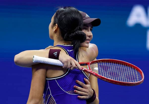 Iva Jovic hugs Alexandra Eala of the Philippines at net after defeating Eala in 3 sets in Arthur Ashe Stadium in the 3rd round at the 2026 US Open Tennis Championship at the USTA Billie Jean King National Tennis Center in New York City on Saturday, September 5, 2026.  NYP20260905135 JOHNxANGELILLO