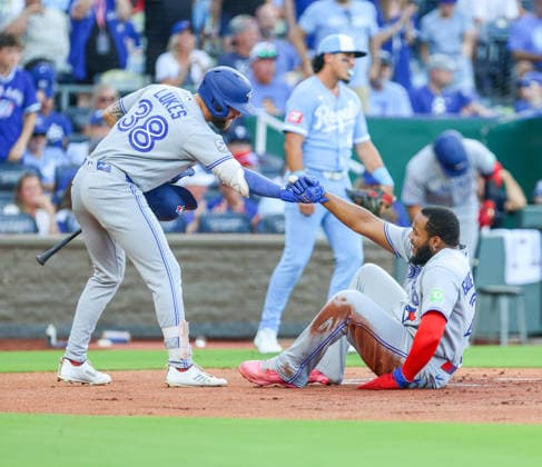 SEP 5, 2026: Toronto Blue Jays first baseman Vladimir Guerrero Jr. (27) is being helped by Toronto Blue Jays outfielder Nathan Lukes (38) after scoring in the 1st inning against the Kansas City Royals at Kauffman Stadium Kansas City, MO. CSM Kansas City United States - ZUMAc04_ 20260905_zma_c04_382 Copyright: xRomanxPunox
